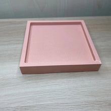 Load image into Gallery viewer, image shows a square trinket tray in a terracotta colour made from jesmonite with a smooth finish