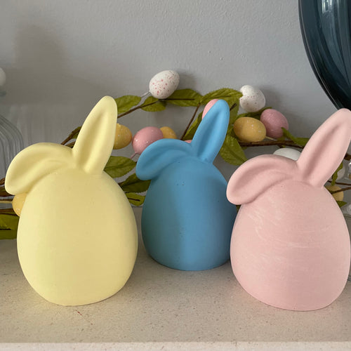 3 Jesmonite Eggs with Bunny ears, shown in Pastel Yellow, Pastel Pink and Blue.