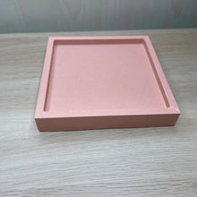 Load image into Gallery viewer, image shows a square trinket tray in a terracotta colour made from jesmonite with a smooth finish
