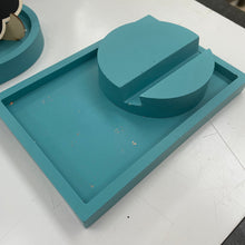 Load image into Gallery viewer, image shows a teal coloured jewellery tray with copper foil flecks with a teal coloured phone holder on top. 
